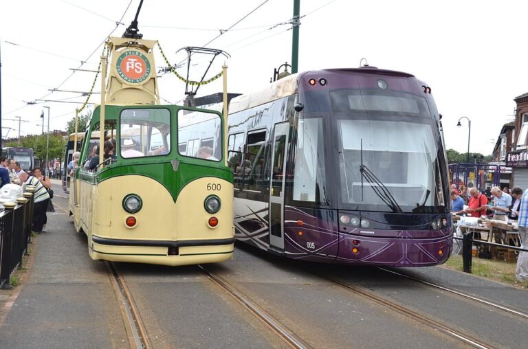A Heritage Tram and a new tram, side by side in Fleetwood town centre, at Tram Sunday
