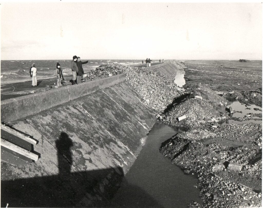 Repairing defences after flooding in Fleetwood