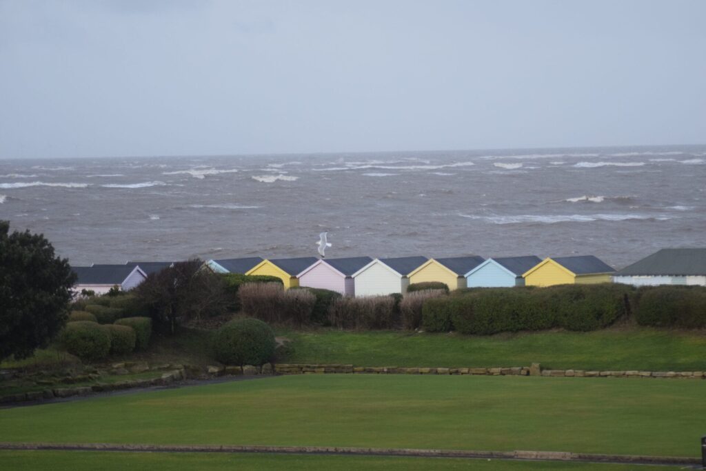 Brrr, beach huts in February, by Peter Cossey