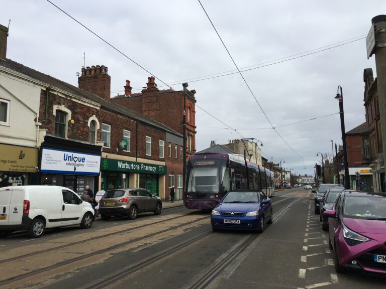 Tram travelling along Lord Street in Fleetwood town centre
