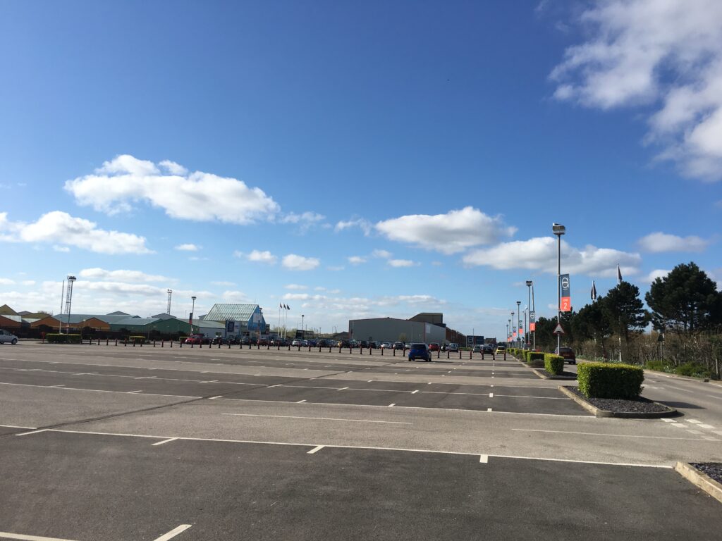 Looking across Affinity Lancashire car park towards site of proposed fish park in the distance